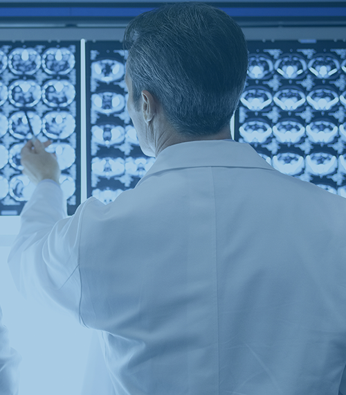Neurology Services _ LA Health Solutions (Doctor looking at brain scan images)